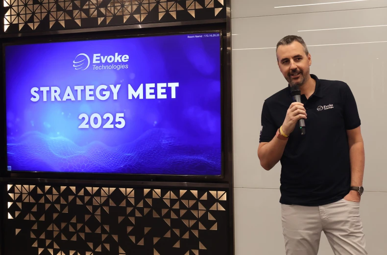 Speaker presenting to an audience